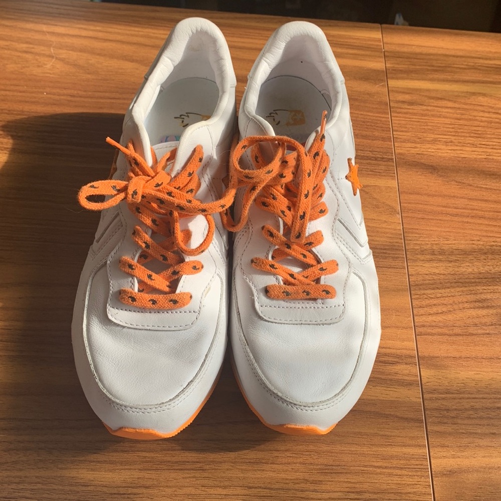 Orange and white limited edition men’s converse. Never worn